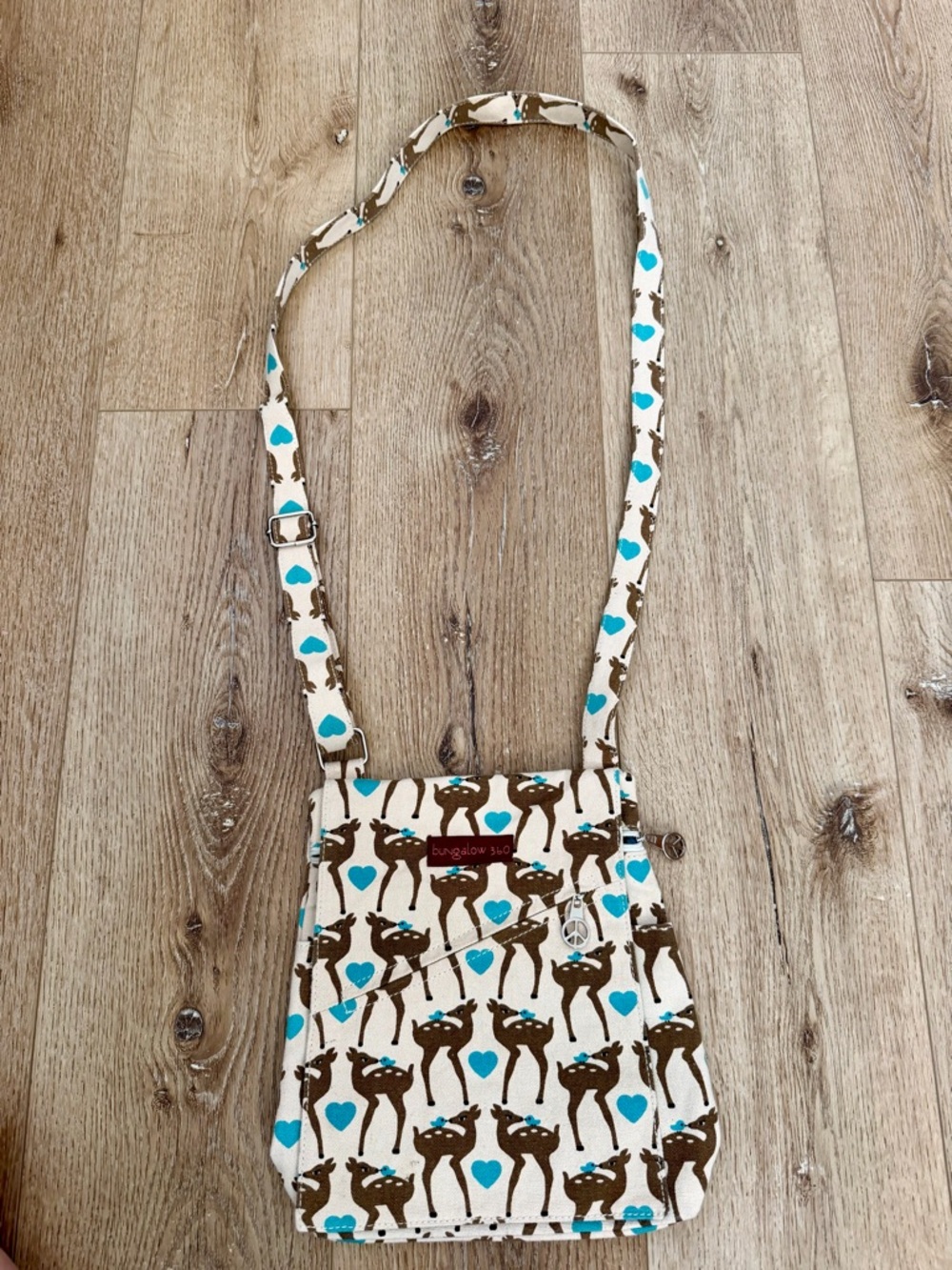 bungalow 360 Cream Crossbody with Brown Deer & Turquoise Hearts